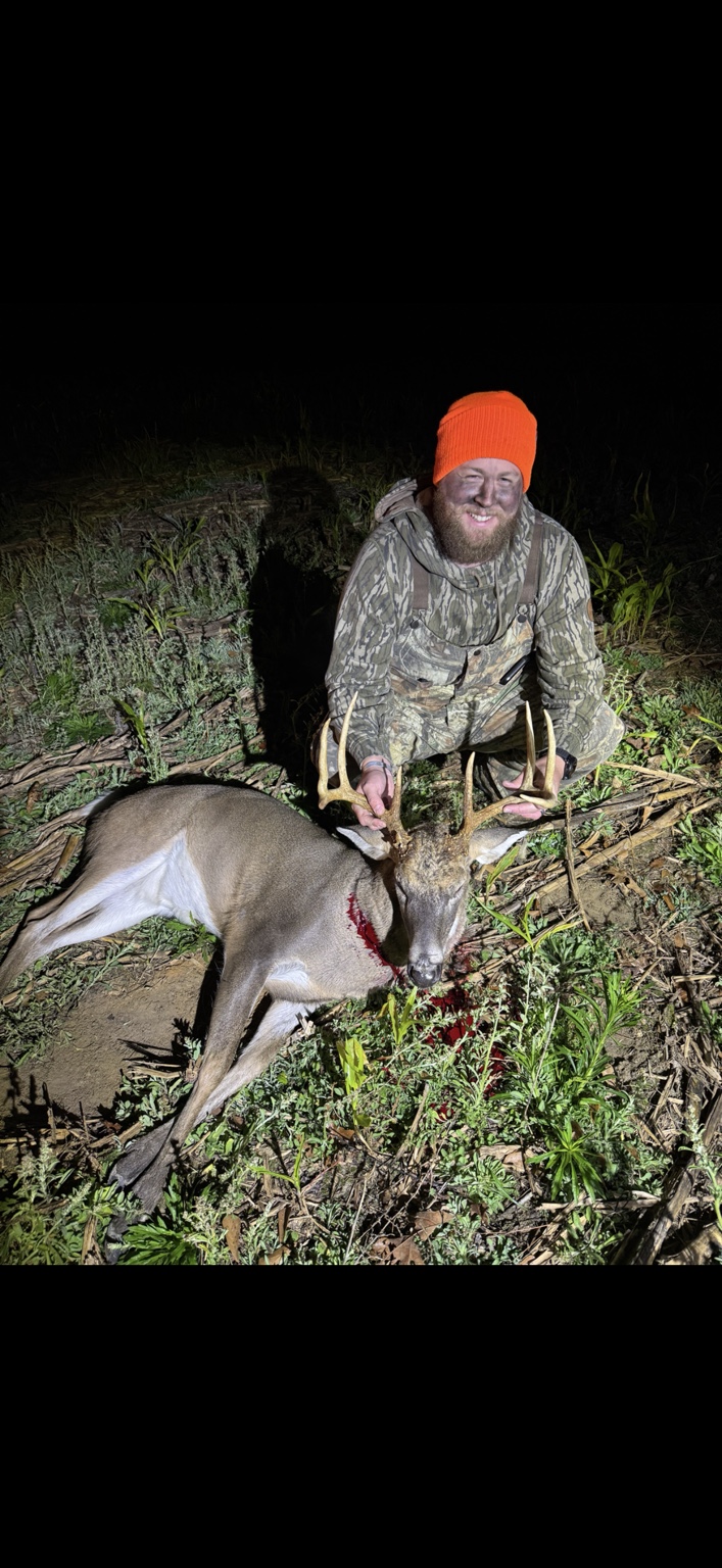 Collin with a harvested whitetail deer